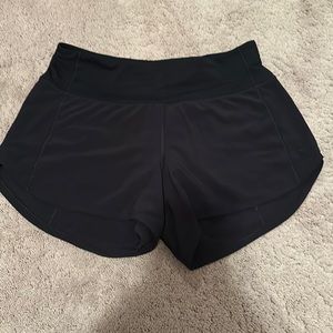 Black lulu lemon shorts. 4 inch seams. Size 6